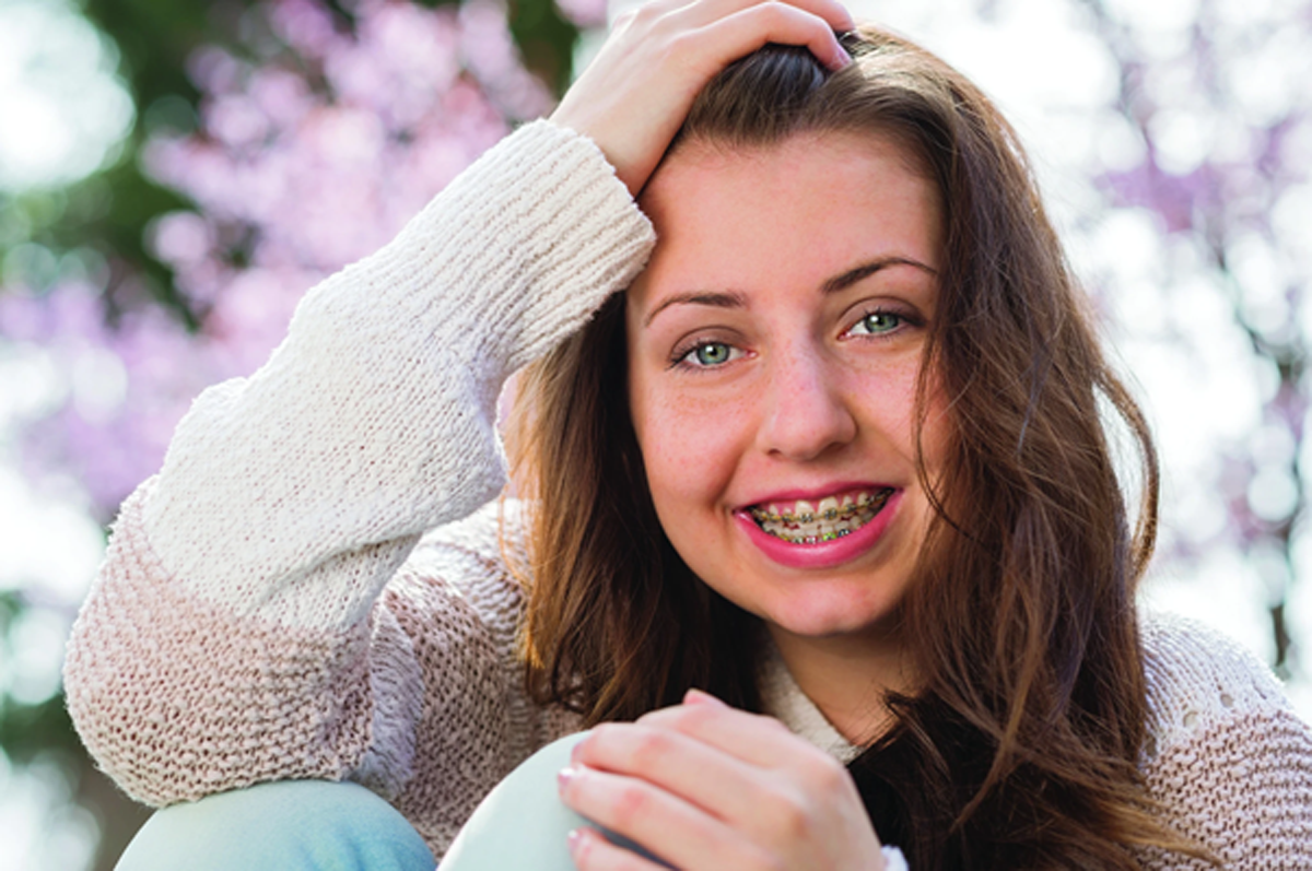 Teenager with orthodontic braces